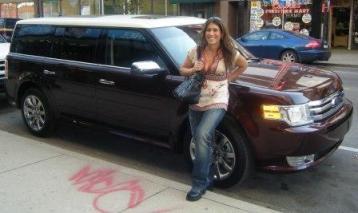 CarsDiva, Demetra Markopoulos, in front of the 2009 Ford Flex Limited in Chicago.